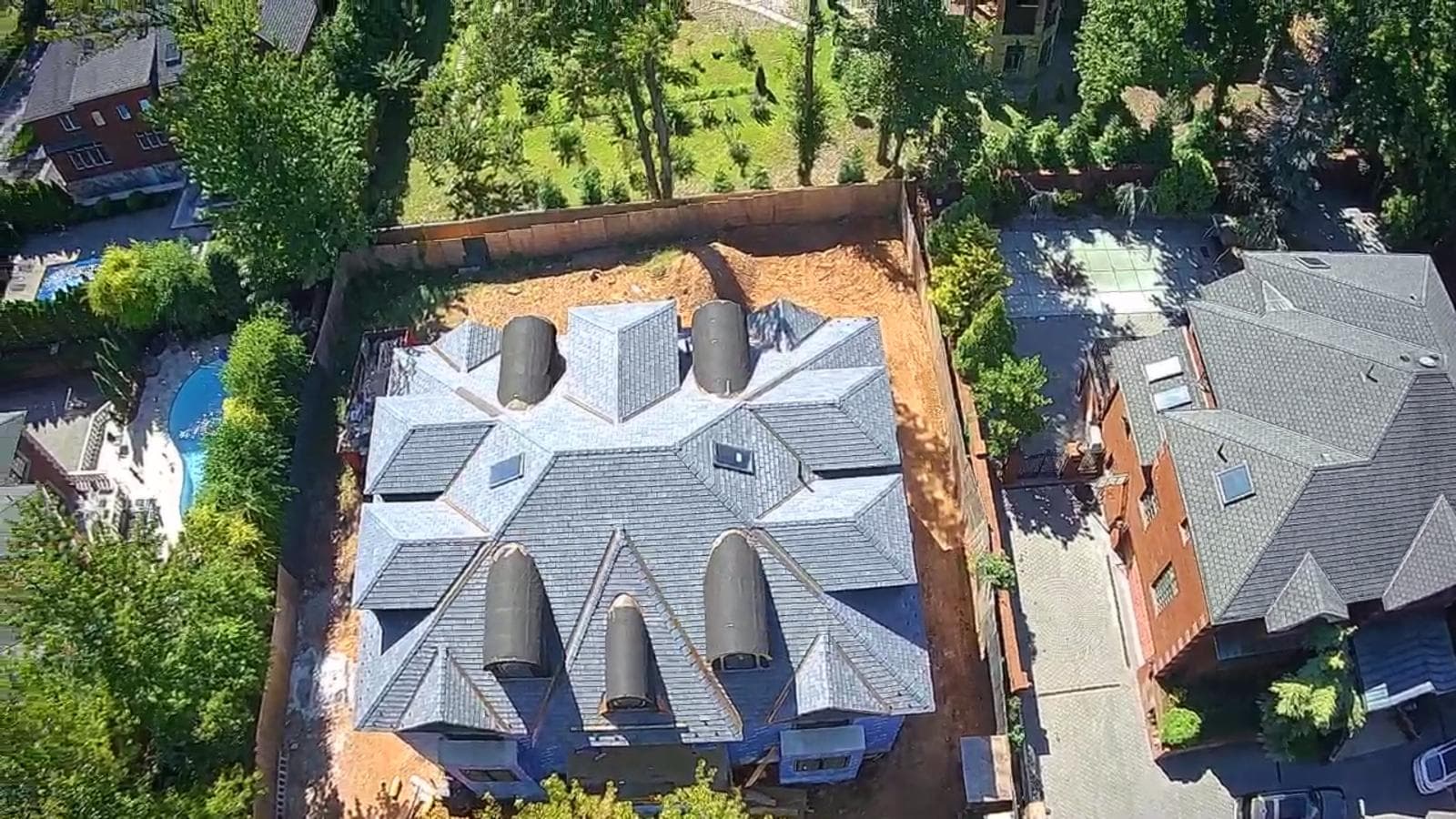 Aerial view of estate with copper dormer detail