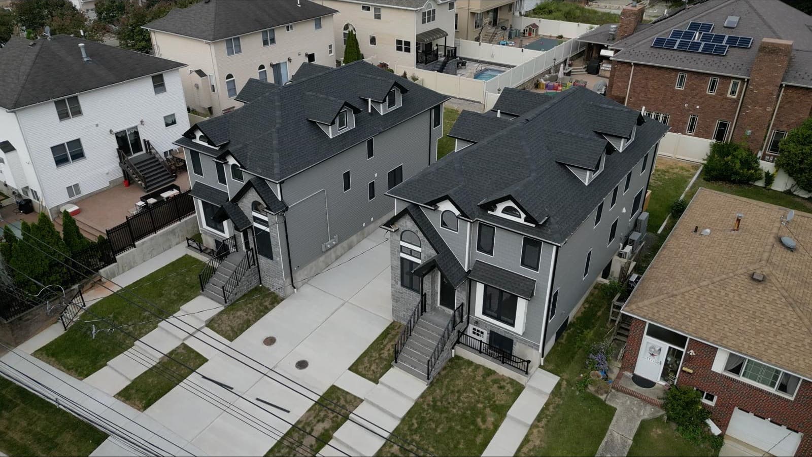 Top-down view of matching gray duplex homes in Staten Island